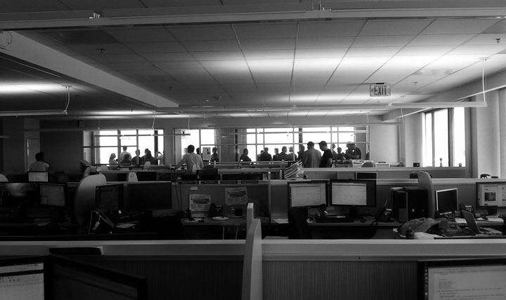 Office gathering by window